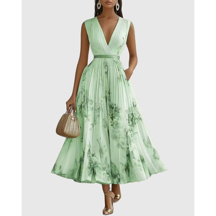 Vestito primaverile lungo con motivo floreale, scollo a V profondo e maniche. Confortevole con pieghe.
