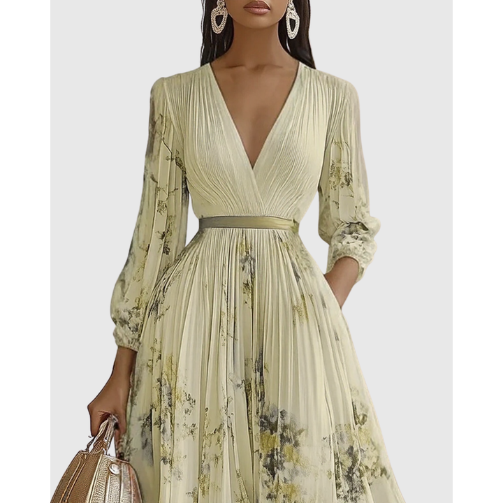 Vestito estivo floreale lungo con maniche e profondo scollo a V, un must-have per la moda donna.