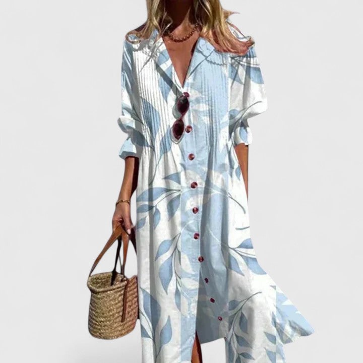 Abito camicia maxi da donna con maniche lunghe, pieghe e bottoni. Perfetto per un look casual elegante.