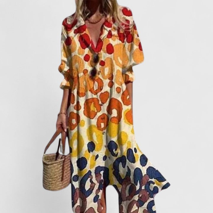 Vestito camicia maxi fluido da donna, maniche lunghe. Morbido e confortevole, con pieghe e bottoni chic.