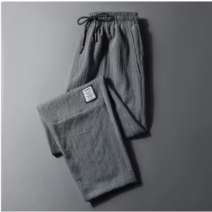 Pantaloni lounge donna blu navy con vita elastica e coulisse, ideali per relax, tempo libero e abbigliamento casa.