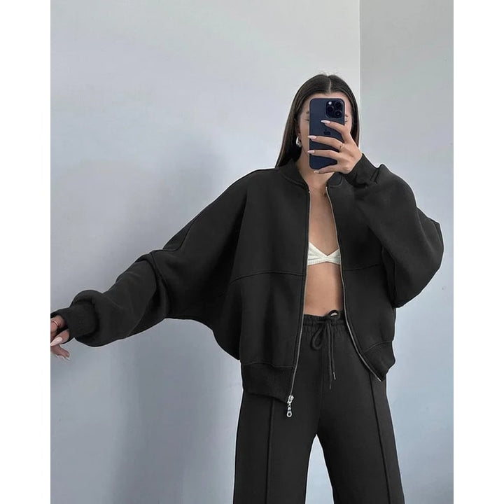 Tuta donna oversize versatile 2 pezzi, adatta a lounge, athleisure, casual quotidiano. Pantaloni gamba larga.
