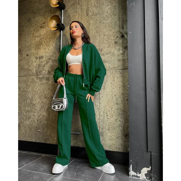 Completo tuta lounge donna oversize 2 pezzi. Pantaloni a gamba larga, giacca con zip. Relax e stile athleisure.