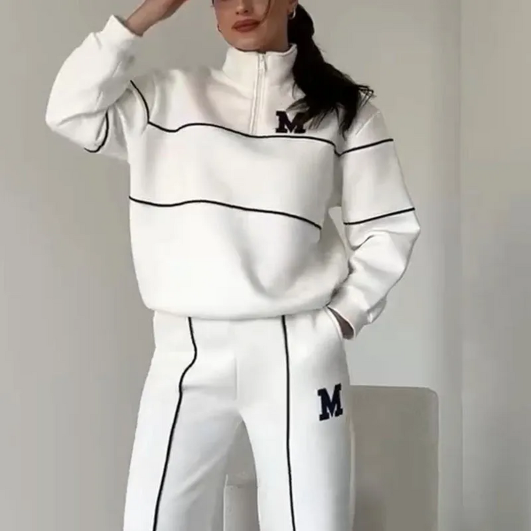 Tuta da salotto donna completa con felpa mezza zip e jogger per il massimo comfort e relax.