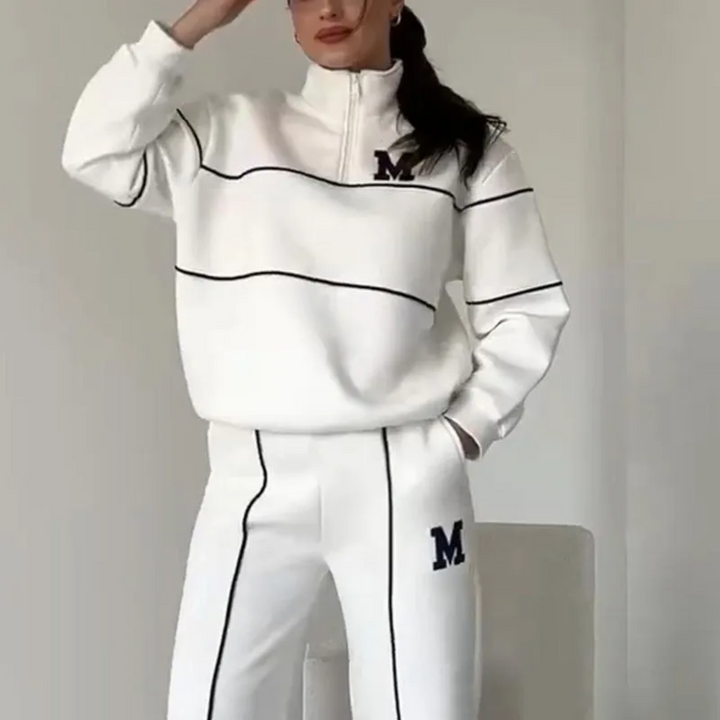 Tuta da salotto donna completa con felpa mezza zip e jogger per il massimo comfort e relax.