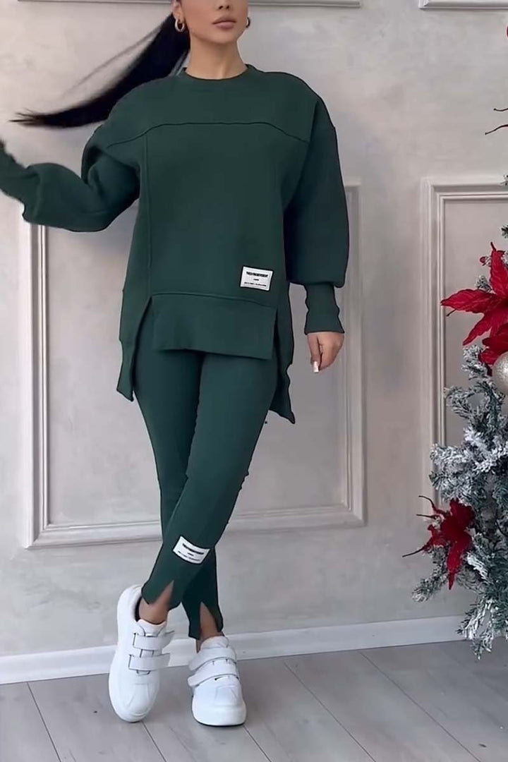 Set due pezzi donna: felpa oversize ampia e leggings slim fit per un look moderno e comfort senza pari.