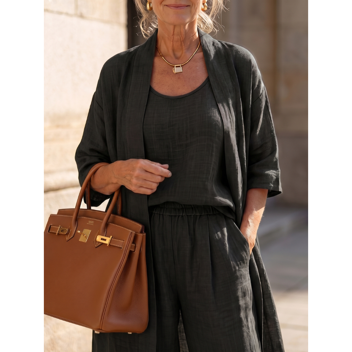 Set donna morbido e fluido: cardigan lungo e pantaloni ampi. Perfetto per un outfit rilassato ma chic.
