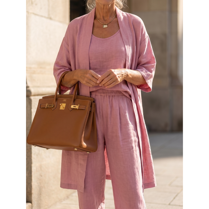 Outfit donna versatile: coordinato con cardigan lungo e pantaloni ampi. Ideale per ogni occasione.