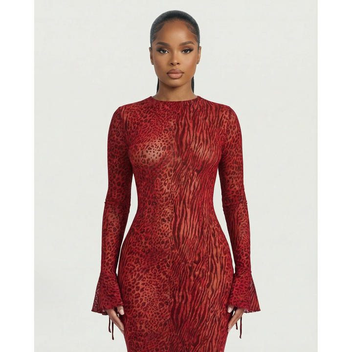 Abito da cerimonia donna maniche lunghe, stampa animalier e schiena scoperta. Eleganza per occasioni speciali.