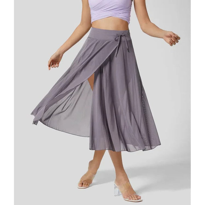 Gonna donna velata a vita alta, stile A-line. Design midi a portafoglio per outfit serali di moda.