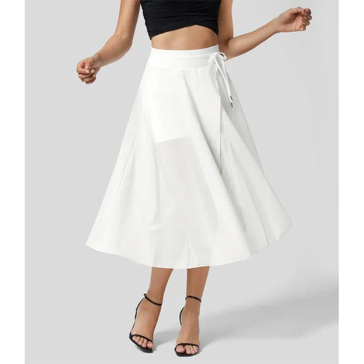 Elegante gonna midi trasparente da donna con vita alta. Stile A-line a portafoglio, versatile e chic.
