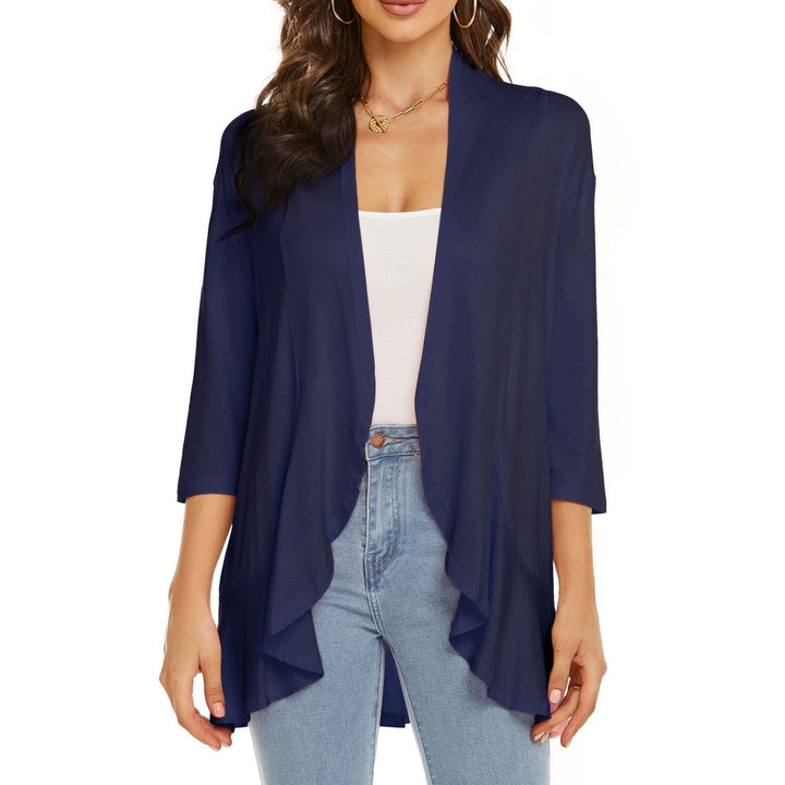 Cardigan donna versatile e aperto, con maniche 3/4. Ideale come strato casual o elegante.