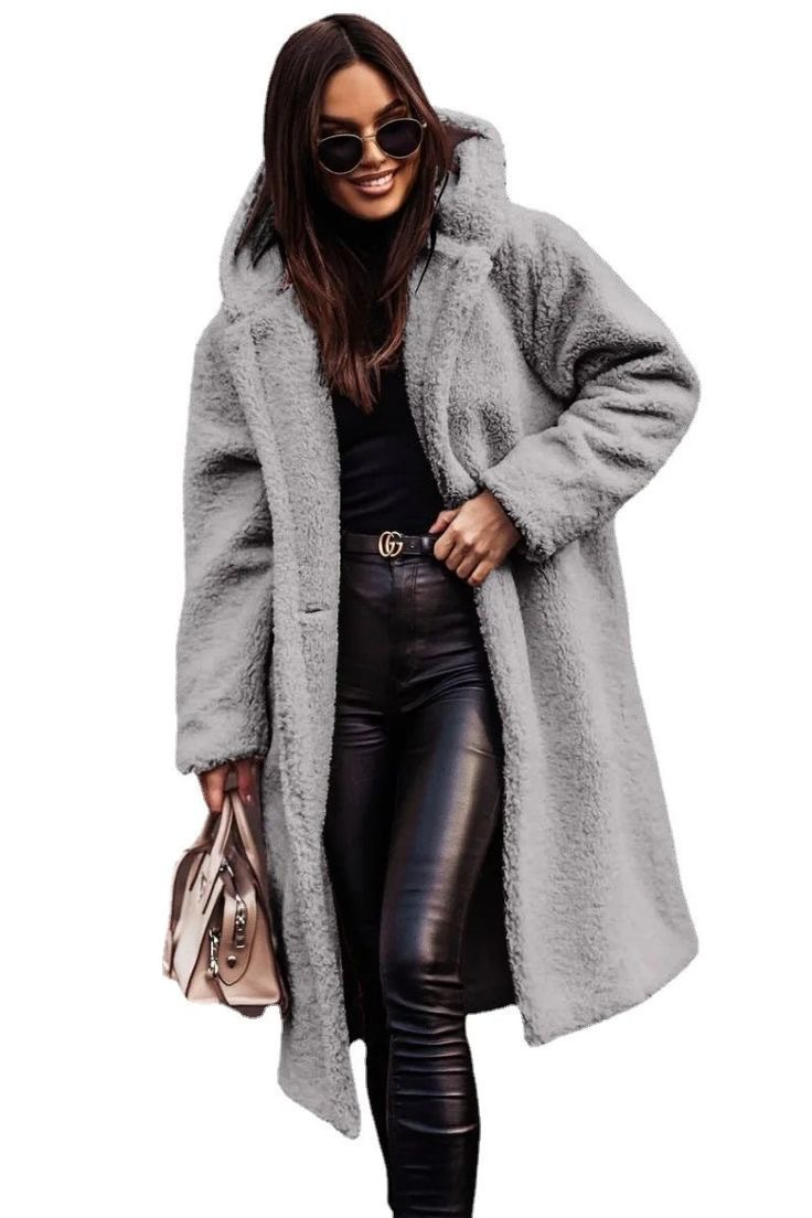 Elegante cappotto lungo oversize da donna con cappuccio, ideale come outerwear invernale e autunnale alla moda.