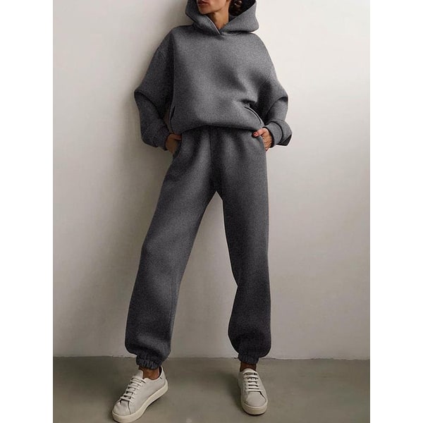 Tuta oversize donna disponibile in vari colori, set hoodie e jogger per un comfort personalizzato.