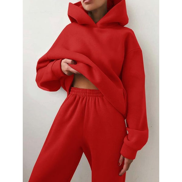 Dettaglio hoodie oversize donna, parte della tuta coordinata. Cappuccio ampio e vestibilità comoda.