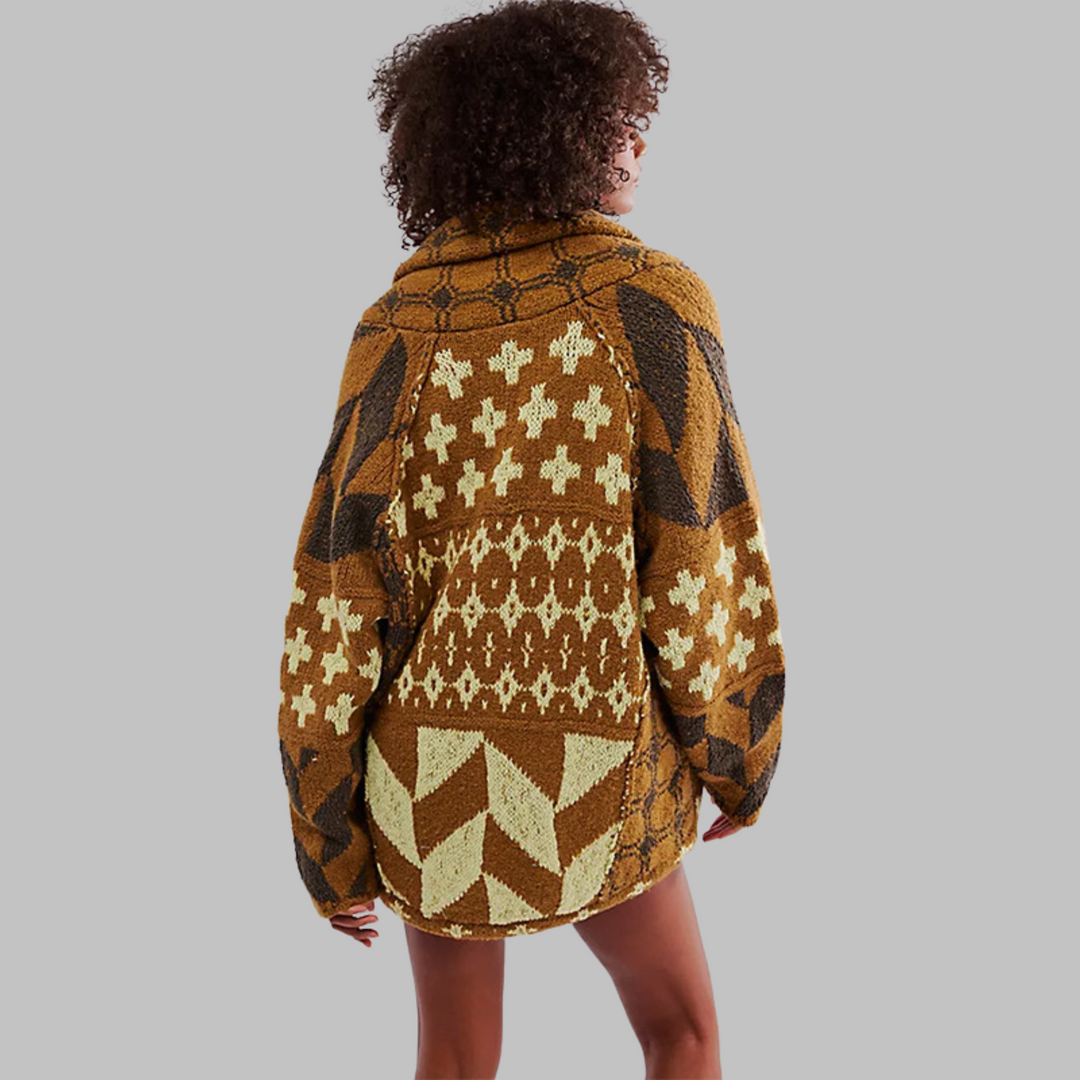 Morbido cardigan donna oversize, lungo, abbottonato. Perfetto per comfort e moda inverno, facile da stratificare.