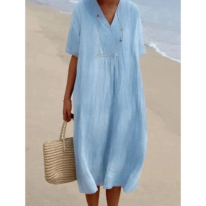 Vestito midi oversize da donna con scollo a V e manica corta, perfetto per l'estate casual e comoda.