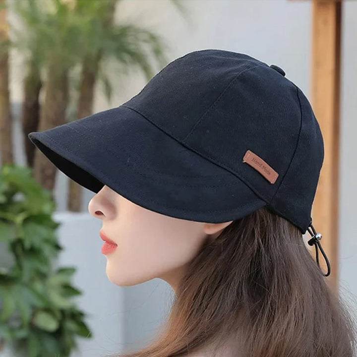Cappello da sole donna pieghevole con tesa larga, perfetto per spiaggia e viaggio.