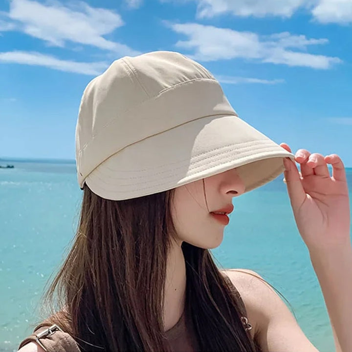 Cappello donna per il sole, ampio e regolabile, ideale per protezione solare in vacanza.