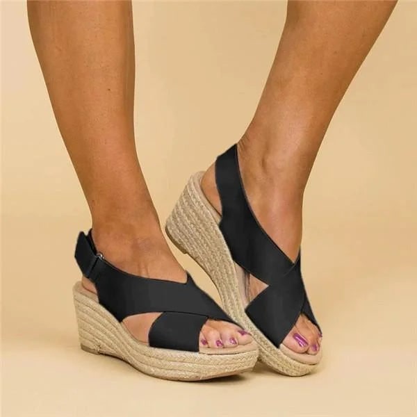 Sandali con zeppa versatili per donna, cinturino incrociato e punta aperta. Perfetti per moda estiva.