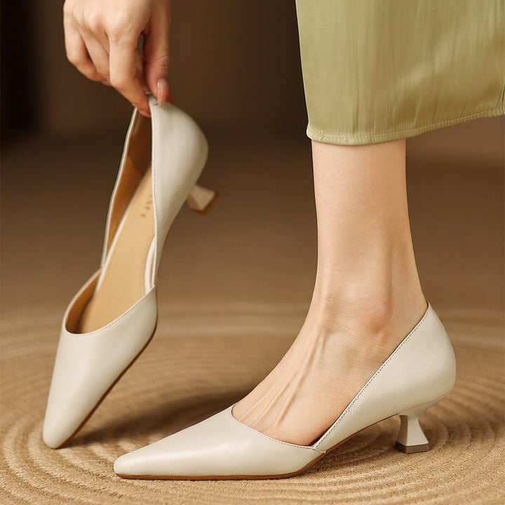 Décolleté da donna tacco basso, look sofisticato e comfort per l'ufficio. Scarpe versatili.