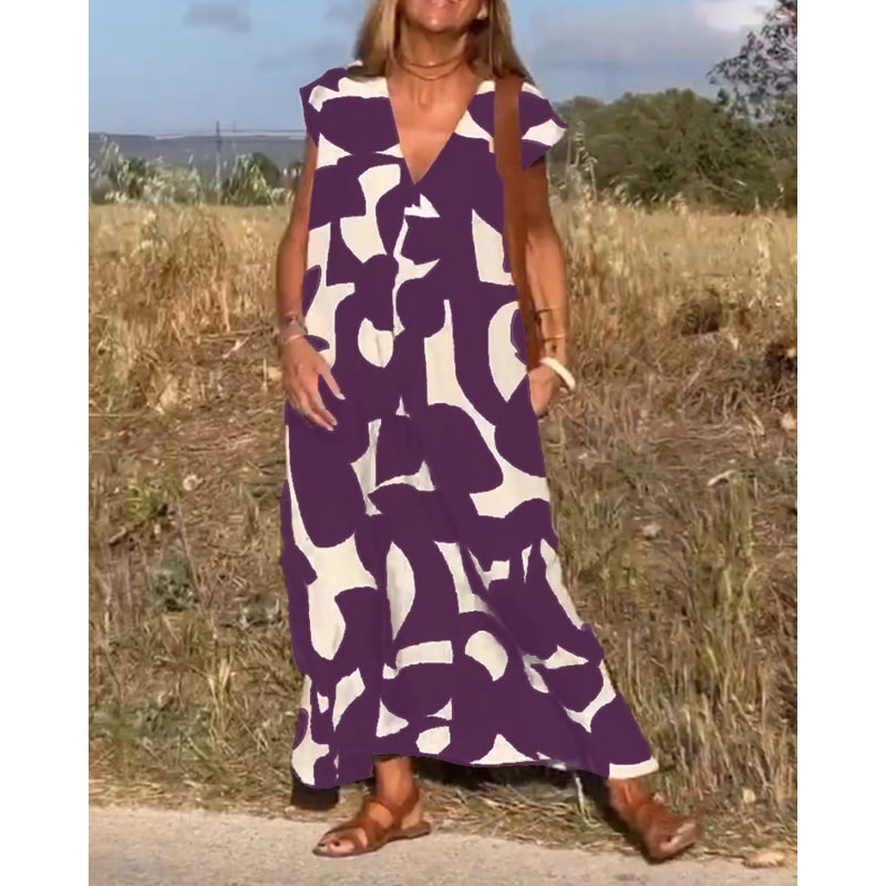 Vestito lungo stampato estivo da donna, scollo a V, maniche ad aletta. Stile comodo e alla moda per le vacanze.