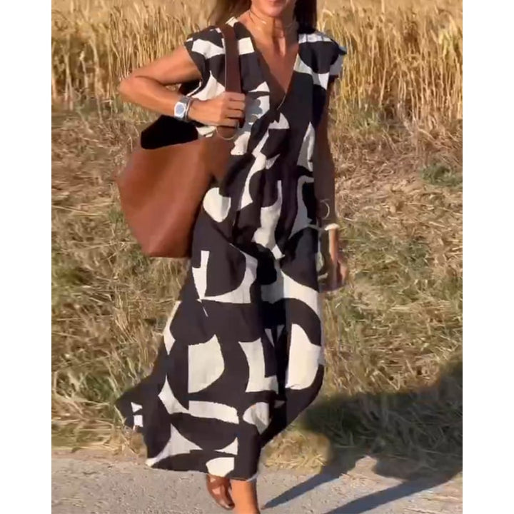 Vestito donna casual chic, maxi stampato floreale, scollo a V, maniche a farfalla. Comodo e alla moda estiva.