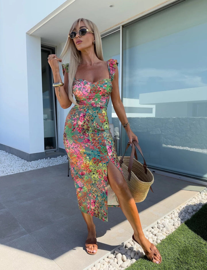 Abito midi stampato da donna con scollo a cuore, spalline arricciate e spacco laterale. Perfetto estivo.