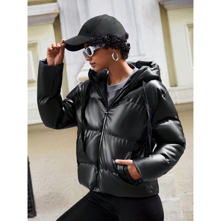 Giacca piumino donna invernale oversize con cappuccio, per un look caldo, comodo ed elegante.