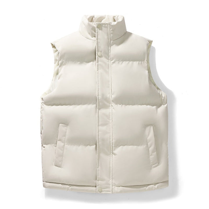 Gilet piumino donna trapuntato con collo alto e tasche a pressione. Versatile per autunno inverno.