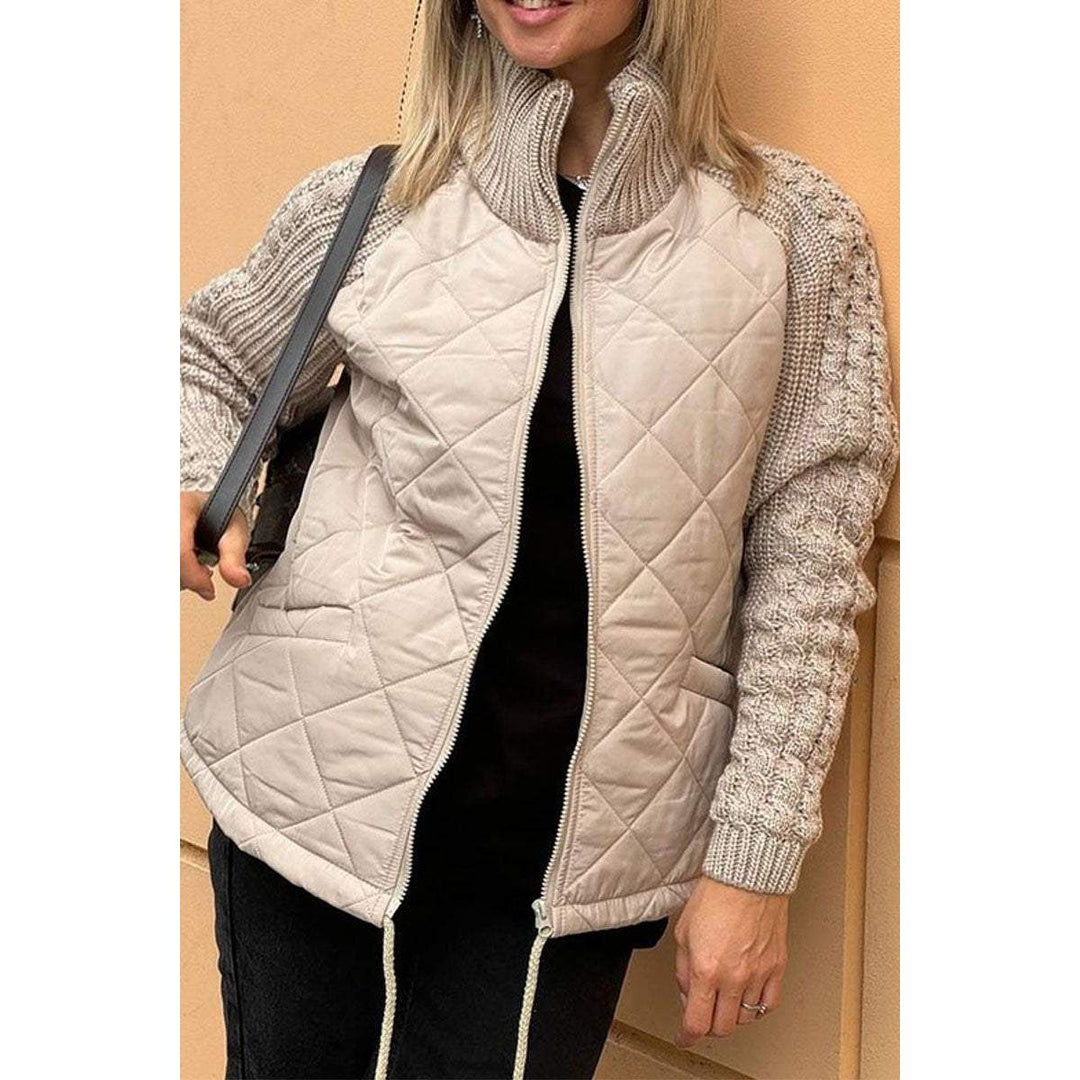Giacca trapuntata donna ibrida con corpo a rombo e maniche in maglia, perfetta per autunno/inverno.