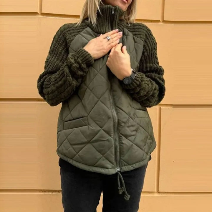 Vista posteriore giacca trapuntata donna con design ibrido, corpo a rombi e maniche in maglia, comfort.