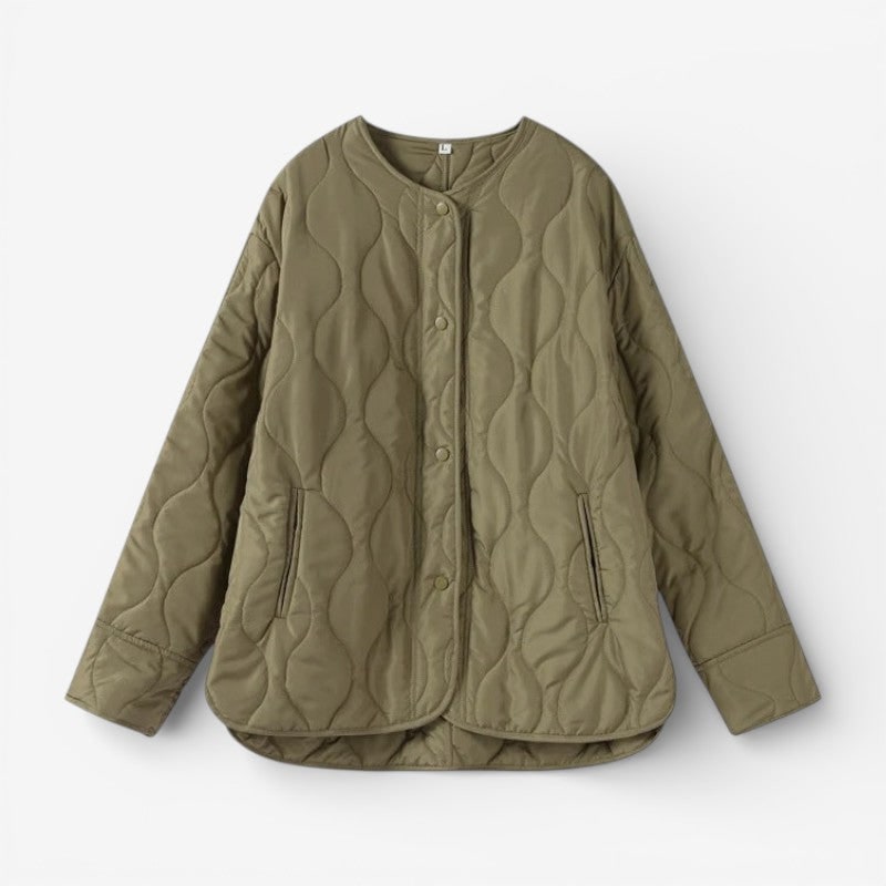 Giacca trapuntata leggera da donna, ideale per stratificazione. Stile casual con bottoni a pressione per autunno/inverno.