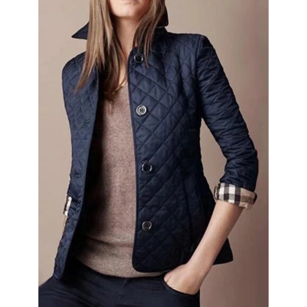 Outerwear donna: giacca trapuntata leggera con collo risvoltato. Stile versatile per l'autunno/inverno casual.
