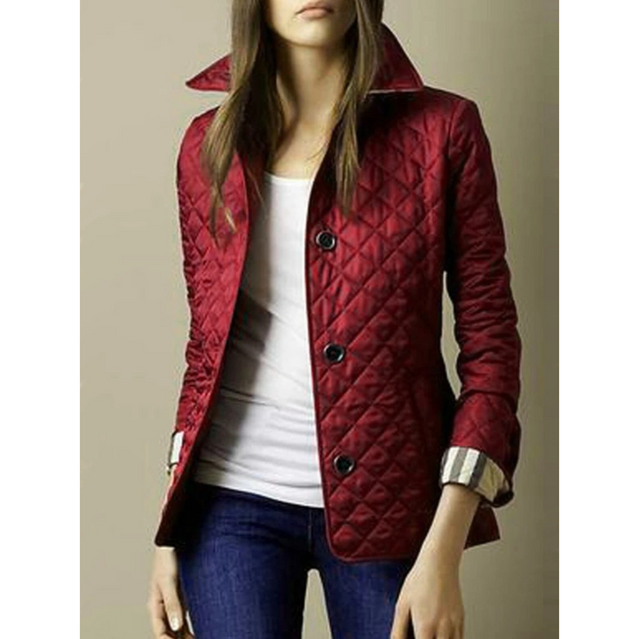 Giacca donna, modello trapuntato slim fit con collo a pieghe e fodera scozzese. Comoda e alla moda.