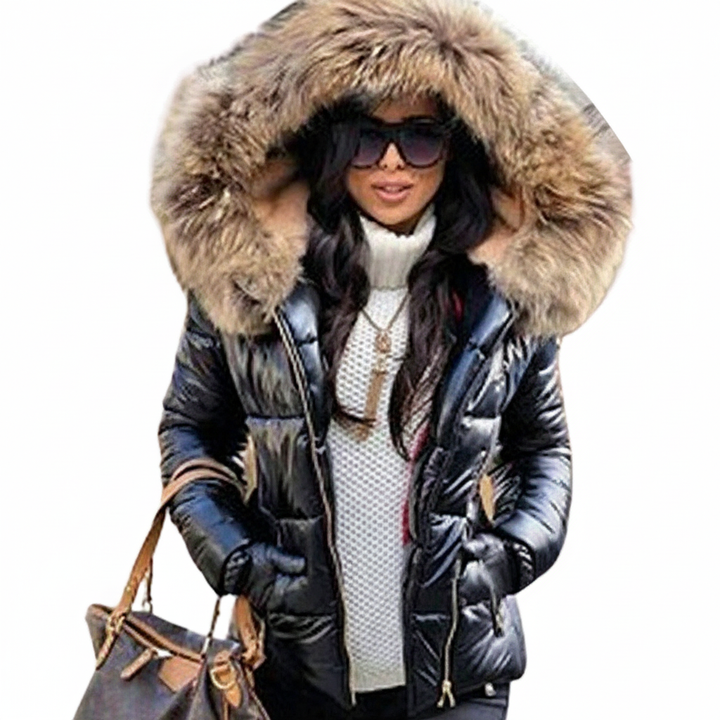 Giacca puffer trapuntata da donna con texture accogliente. Cappuccio con pelliccia sintetica. Perfetta per il comfort.