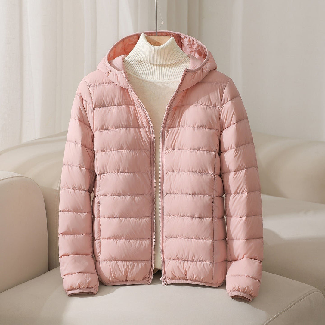 Giacca donna trapuntata, calda e confortevole con cappuccio. Ideale per abbigliamento invernale ed autunnale.