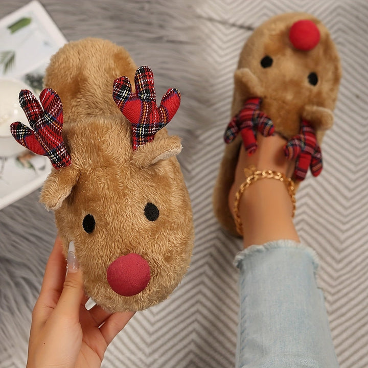 Pantofole da donna slip-on con renna natalizia, perfette per il comfort invernale e le feste.