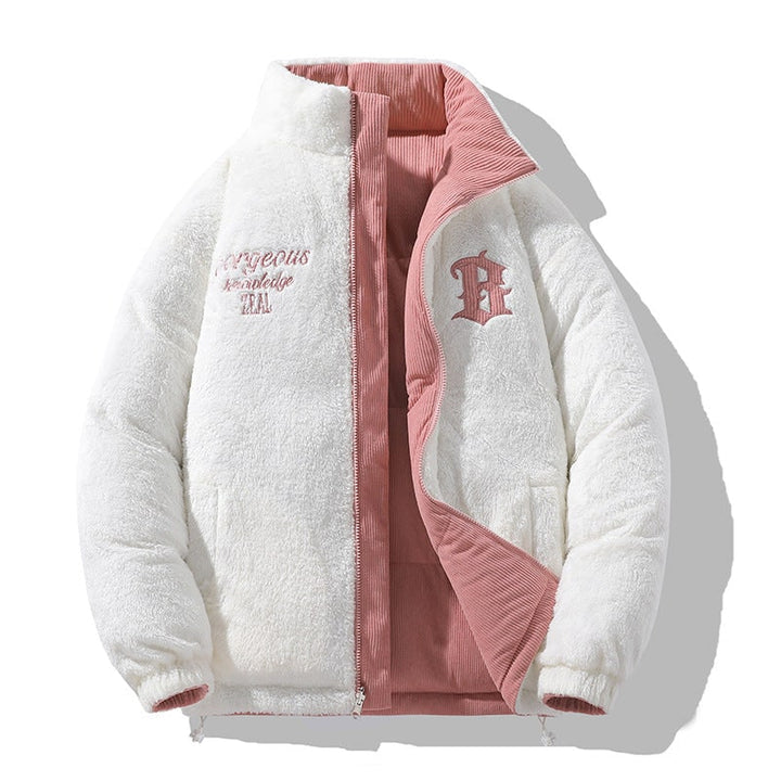 Outerwear donna: piumino trapuntato reversibile, collo alto, giacca calda per un look autunno inverno.