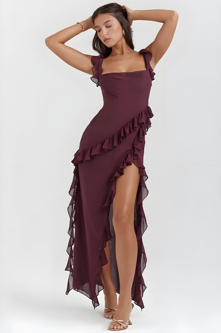 Vestito lungo donna elegante con balze sul fondo e spacco laterale. Ideale per cerimonia.
