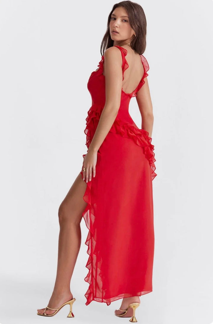 Vestito da sera lungo donna con balze raffinate e spacco sensuale. Ideale per eventi e moda.