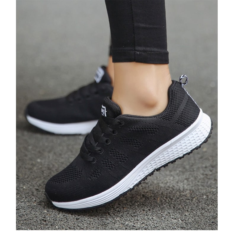 Scarpe da passeggio donna leggere e comode, con design moderno e lacci, perfette per il tempo libero.