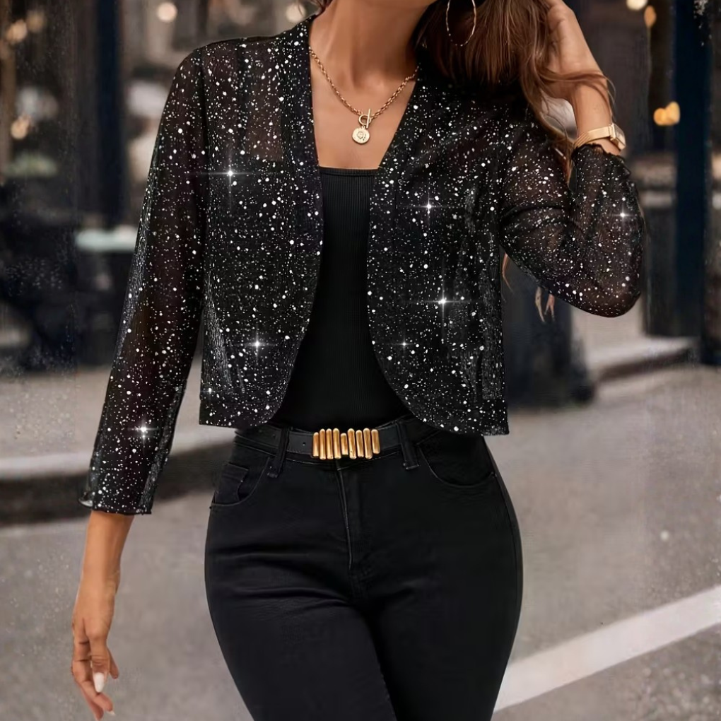 Bolero donna corto elegante e versatile. Coprispalle chic brillante, ideale per occasioni speciali e moda.
