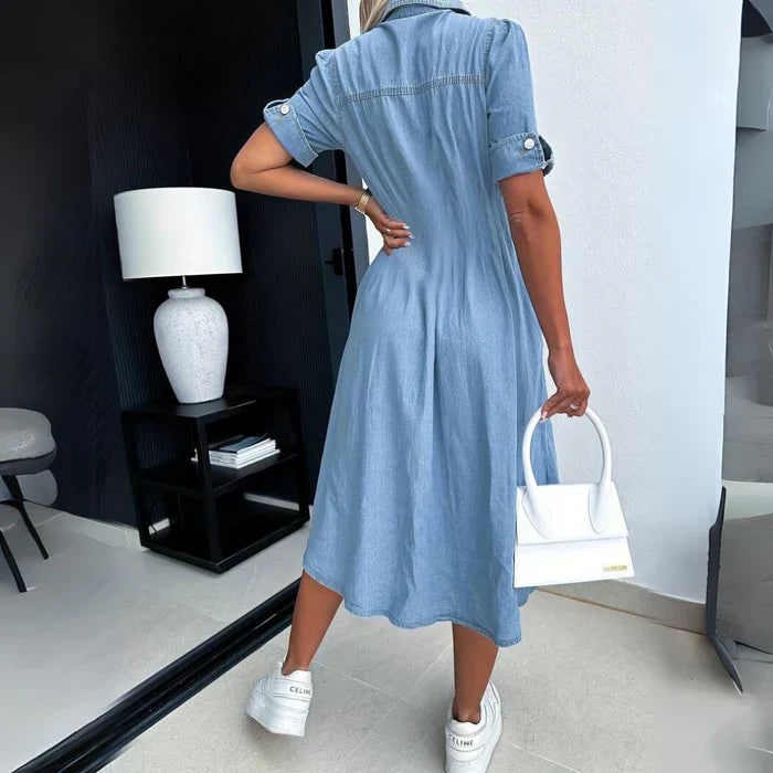 Dettaglio abito camicia midi donna, bottoni e taglio a linea A. Look elegante e comodo per la moda primavera estate.