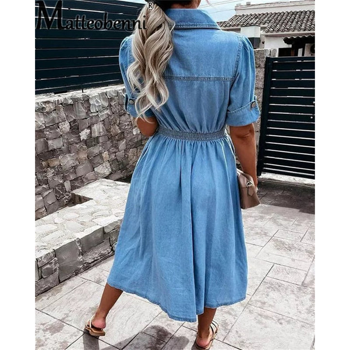 Abito donna midi a camicia con bottoni e maniche corte per outfit primaverili ed estivi. Versatile e per ogni giorno.