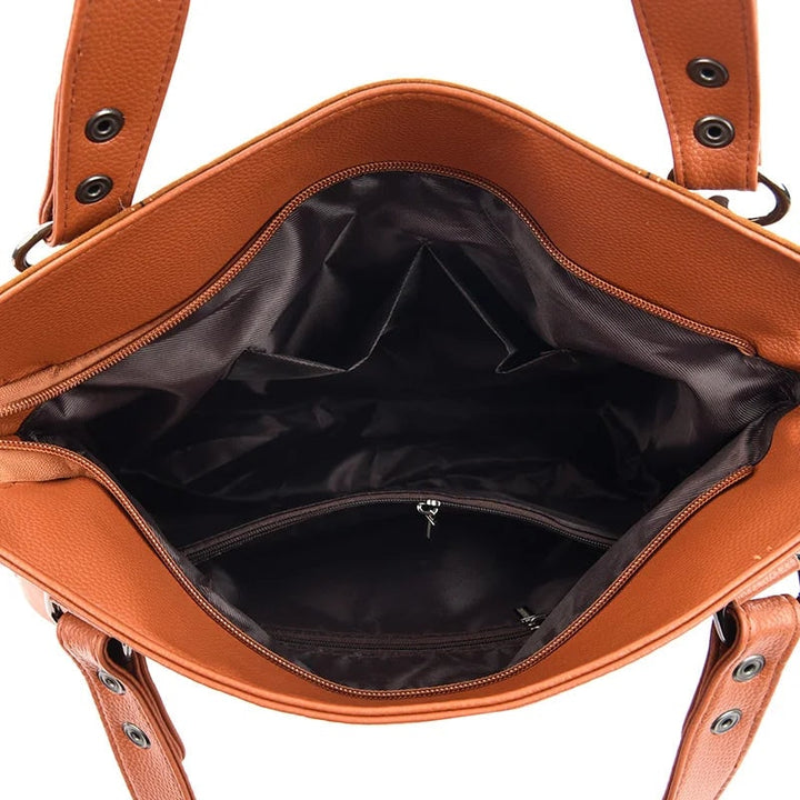 Borsa a spalla versatile, design strutturato in pelle e camoscio. Ideale per ogni occasione donna.