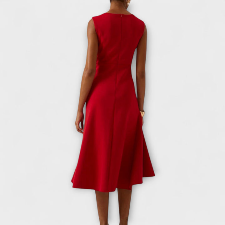 Abito midi donna raffinato senza maniche, scollo a barca. Perfetto per festa, matrimonio e sera. Stile sofisticato.