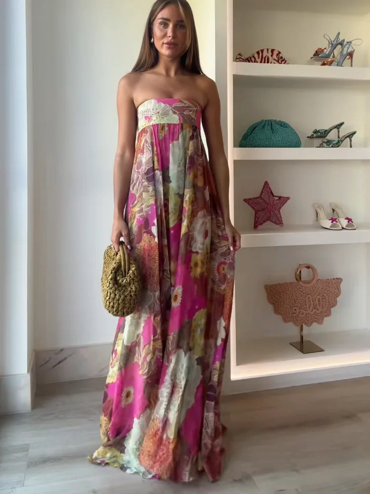 Abito lungo donna floreale con bustier e vita impero, elegante per eventi speciali.