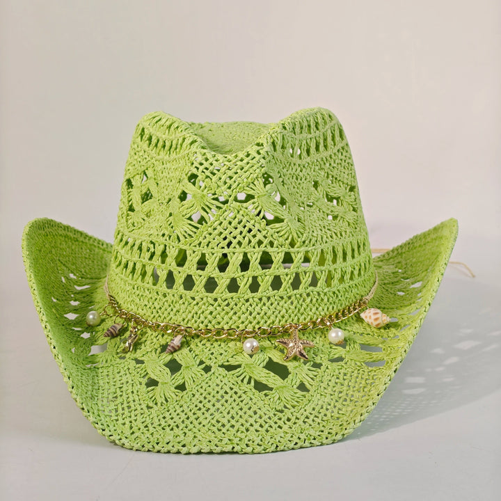 Copricapo da cowboy donna in paglia, accessorio estivo chic per un look western e bohemien.