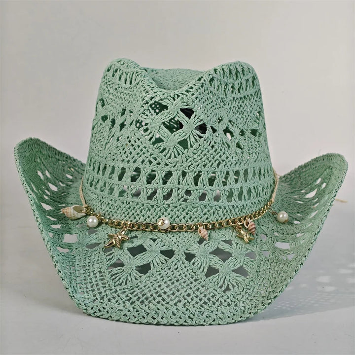 Cappello da cowboy donna di paglia, con dettagli intrecciati e charm, per mare o festival.